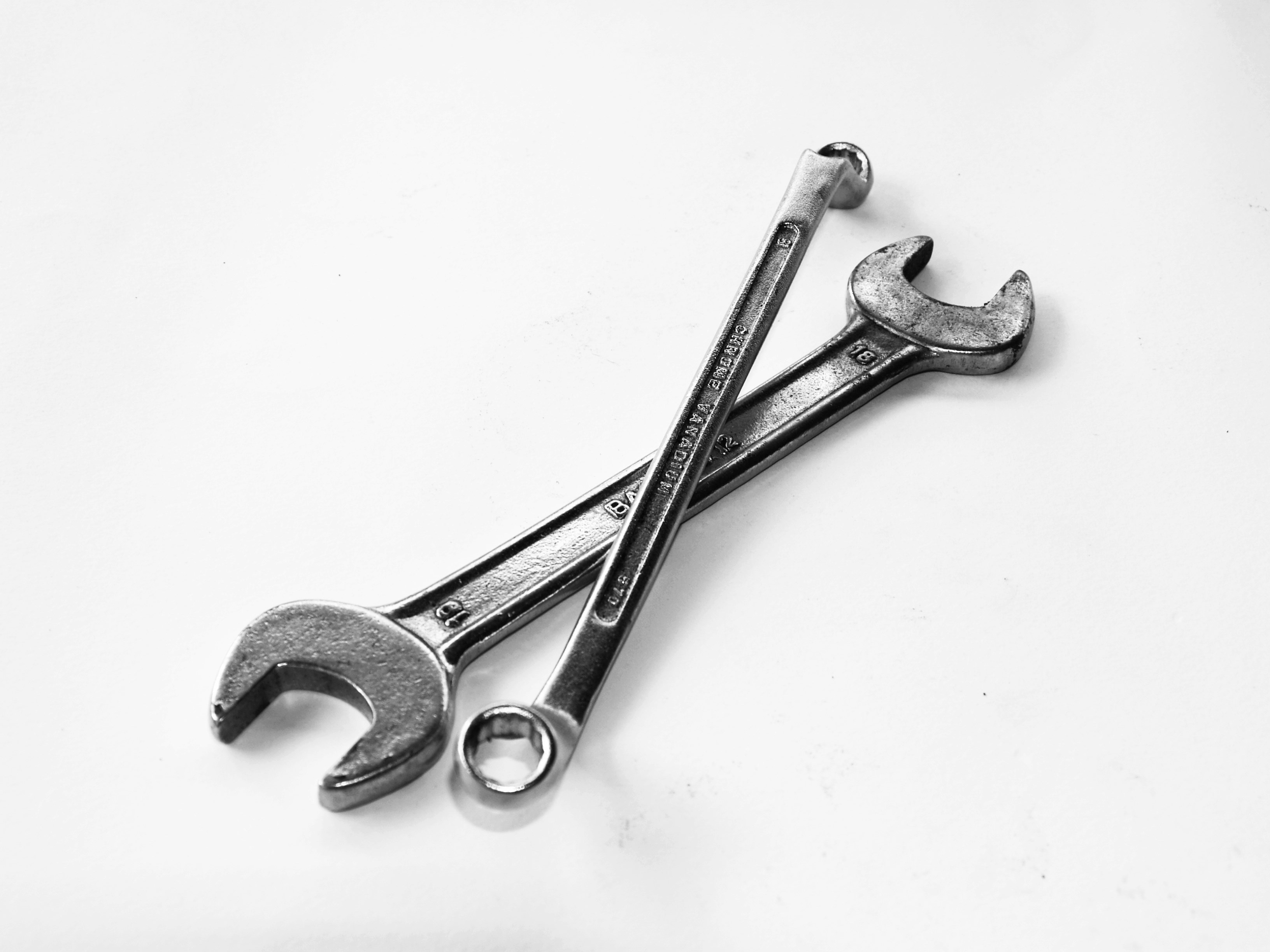 2 wrenches on a white background
